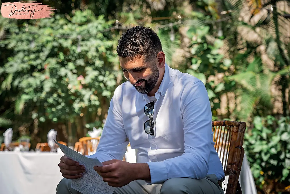 Groom Reading Letter Note before wedding, 2021 Wedding Sundial Resort, Sanibel Florida Wedding, Doodle Fly Photography Beach Wedding SWFL