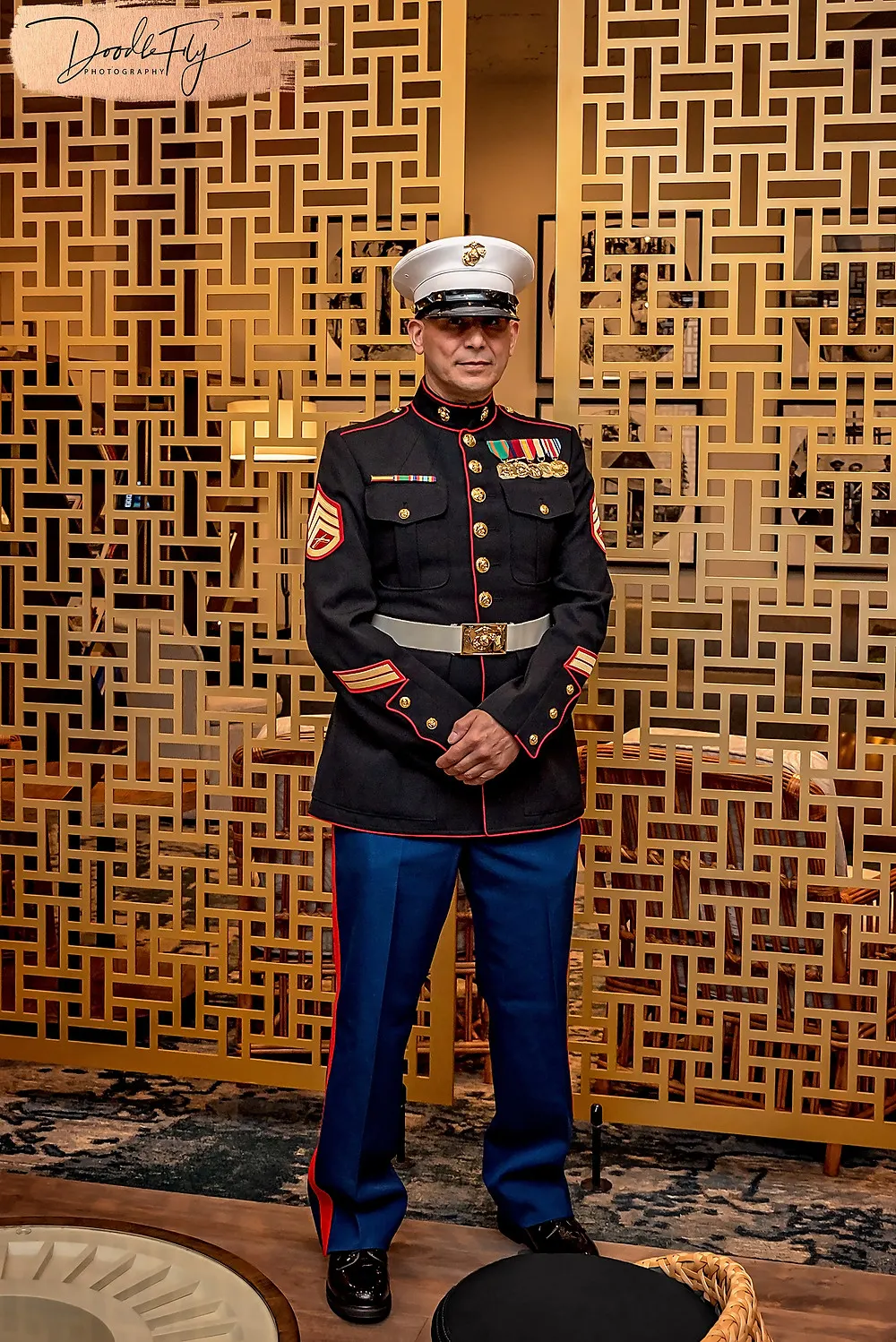 Doodle FLy Photography wedding photo of Groom in Navy uniform before wedding at the Luminary Hotel and Burroughs Home Venue in Fort Myers Florida